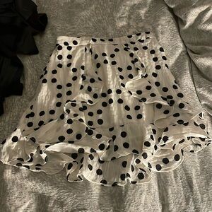 White skirt with black polka dots